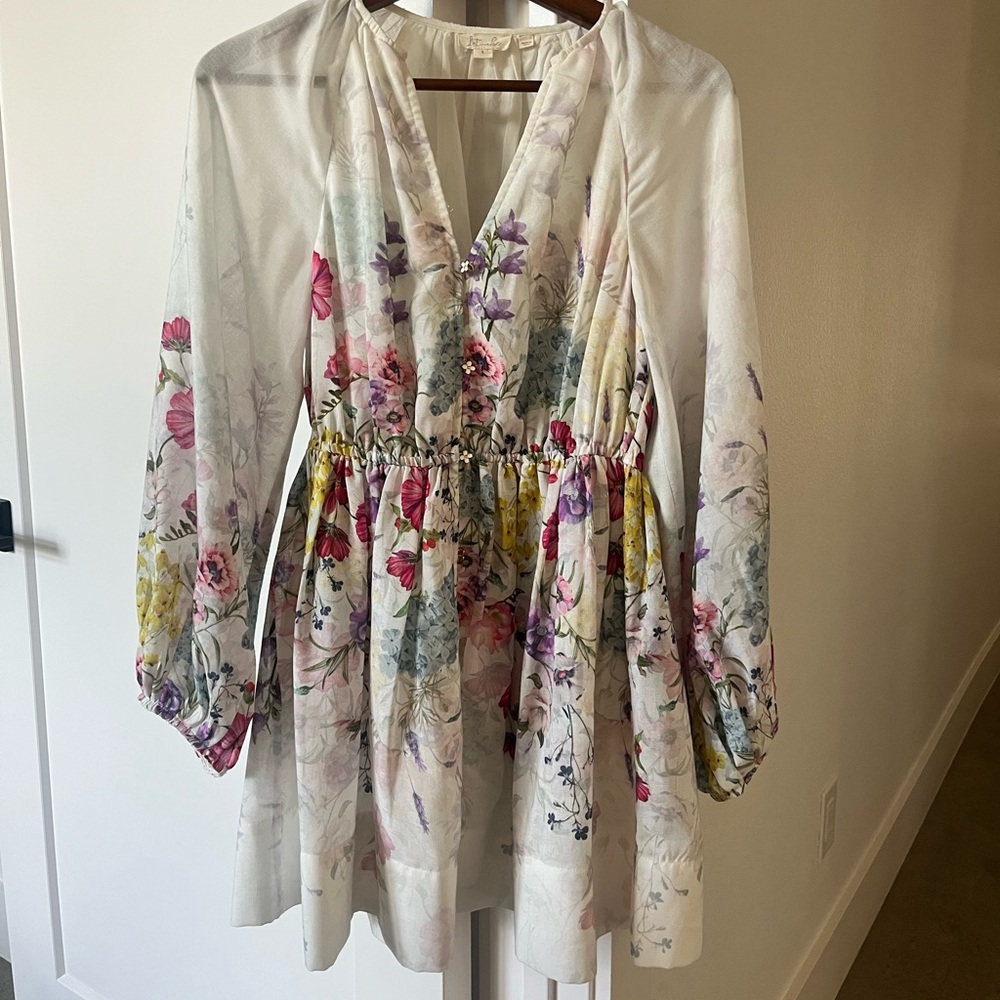 Anthropologie
Let Me Be v-neck A-line mini floral dress.